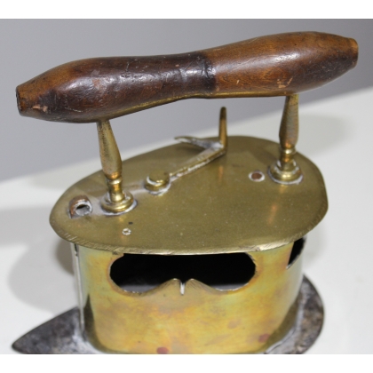 Iron made of brass, copper and iron