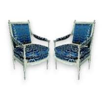 Paire de fauteuils Louis XVI laqués blanc