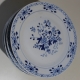 Assiette en porcelaine décor fleurs bleues