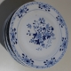 Assiette en porcelaine décor fleurs bleues