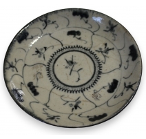 Petite assiette en porcelaine décor fleurs noires