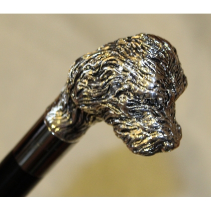 Walking stick with a silver poodle knob