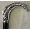 Walking stick with a silver fish-shaped knob