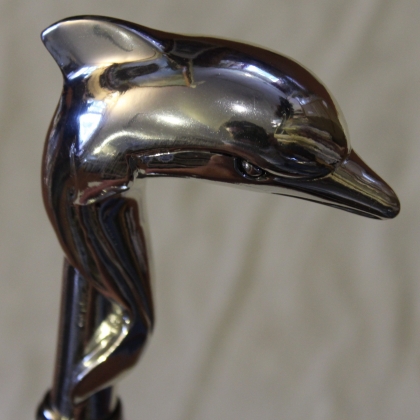 Walking stick with a silver dolphin-shaped knob