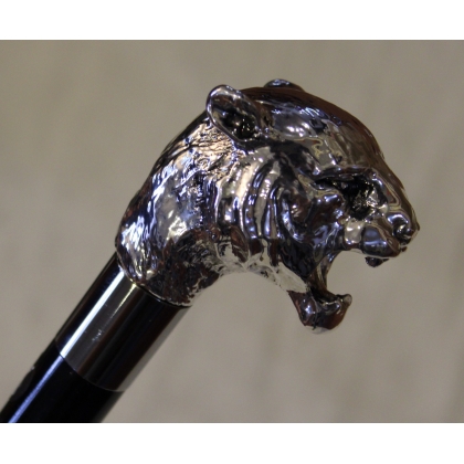 Walking stick with a silver tiger-patterned knob