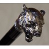 Walking stick with a silver tiger-patterned knob