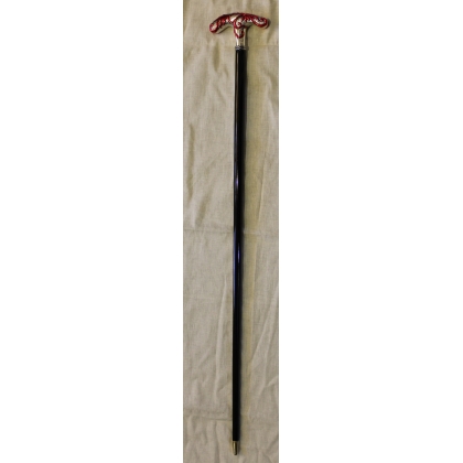 Walking stick with a silver handle decorated with red