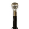 Long shoehorn with a silver ball-shaped knob