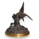 Moineau guettant un escargot en bronze