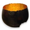 Large black and gold metal bowl