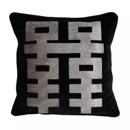 Cushion with a silver geometric pattern on a black background