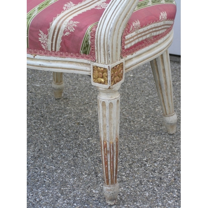 A pair of Louis XVI armchairs, lacquered in white and gold, by  Moinat SA  - Antiques and interior design
