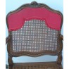 Regency cane armchair with red valance at  Moinat SA  - Antiques and home décor