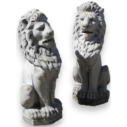 Pair of sitting lions, white.