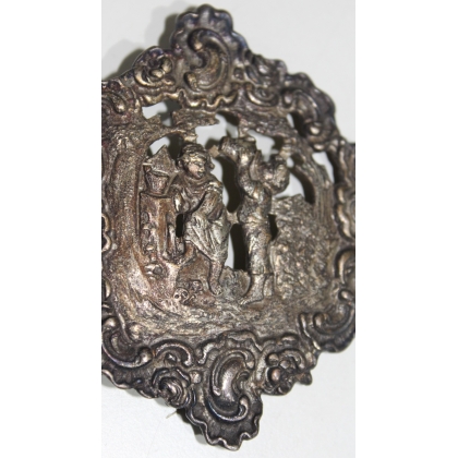 Silver belt buckle