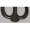 Bronze belt buckle with a shell design