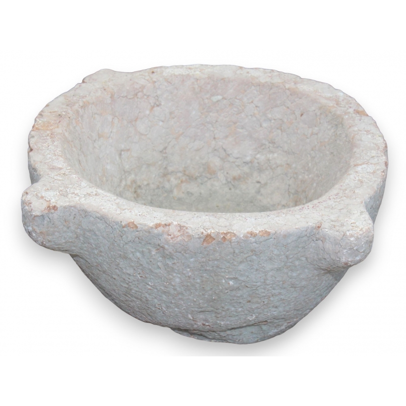 Pink stone holy water font
