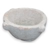 Pink stone holy water font
