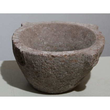 Pink stone holy water font