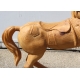 Cheval en bois sculpté brut