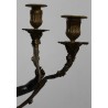 A pair of candlesticks depicting Cupids, signed L. GRÉGOIRE