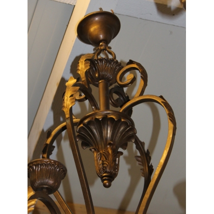 Lustre en fer doré à 4 lumières