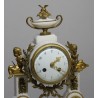 Louis XVI-style white marble pendulum clock on  Moinat SA  - Antiques and home décor