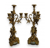 Paire de chandeliers style Louis XVI.