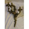 A pair of Louis XV-style bronze wall sconces