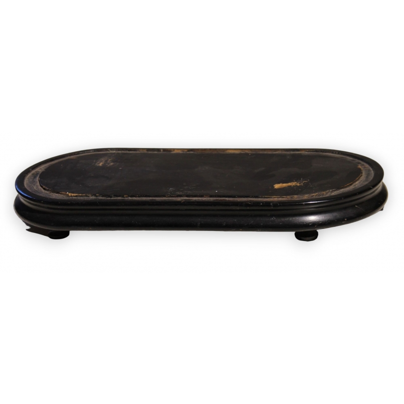 Oval clock base in blackened wood