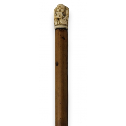 Walking stick with a ‘Netsuke’ pommel, rattan shaft