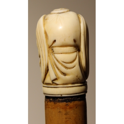 Canne avec pommeau "Netsuke", fût en jonc