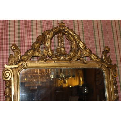 Espejo Luis XVI dorado. En  Moinat SA  - Antigüedades y decoración