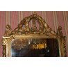 Espejo Luis XVI dorado. En  Moinat SA  - Antigüedades y decoración