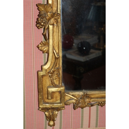 Espejo Luis XVI dorado. En  Moinat SA  - Antigüedades y decoración