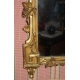 Miroir Louis XVI doré.