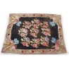 Kilim rug with a rose pattern on a black background