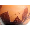 Purple bulb-shaped vase on a pink background, signed GALLÉ