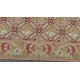 Tapis Arraiolos décor fleurs rose fond beige