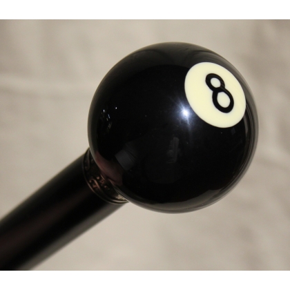 Cue with a '8' billiards ball pommel