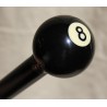 Cue with a '8' billiards ball pommel