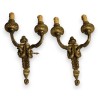 A pair of Louis XVI-style wall lights with two lights