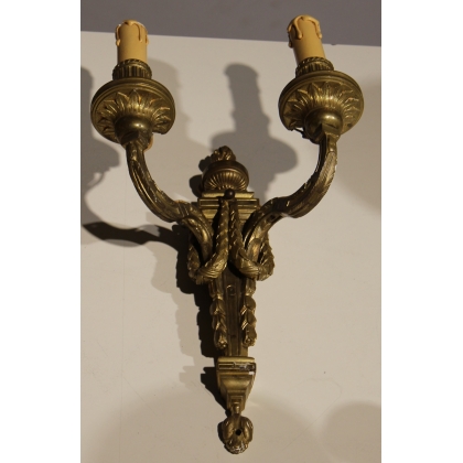 A pair of Louis XVI-style wall lights with two lights