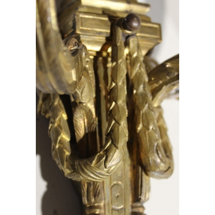 A pair of Louis XVI-style wall lights with two lights