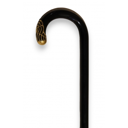 Black wooden walking stick with a gold handle