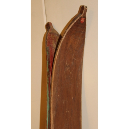 A pair of BADAN Kung Bore skis with poles