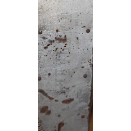 A pair of BADAN Kung Bore skis with poles