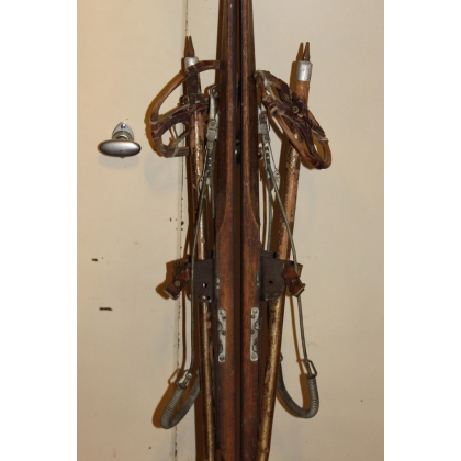 A pair of Louis ROCHAT skis with poles