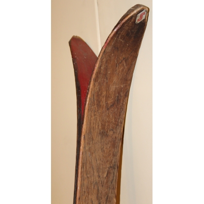 A pair of Louis ROCHAT skis with poles
