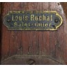 A pair of Louis ROCHAT skis with poles